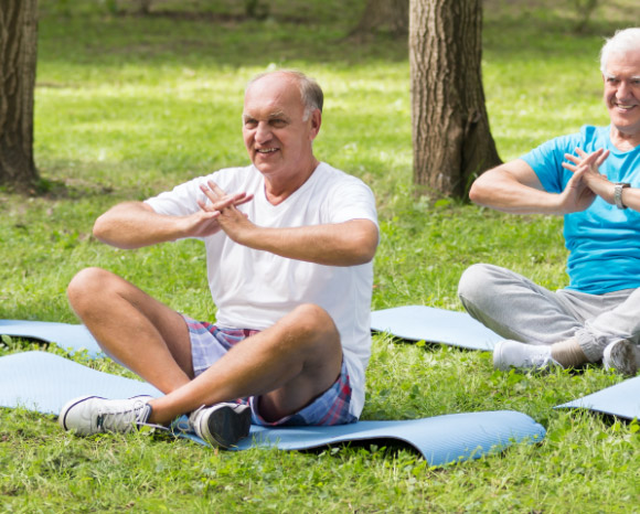 mature man exercising in park