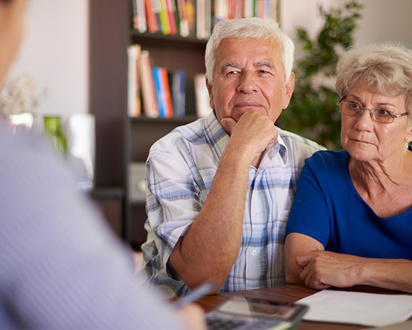 mature couple working with counselor